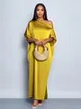 Full-length detail of elegant one-shoulder yellow satin maxi dress in glossy silk-like fabric - S / Yellow