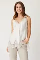 Detail of white V-neck camisole featuring intricate lace patchwork and eyelash trim - S / Tops / White