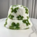 Detailed macro view of soft fuzzy faux fur bucket hat with vibrant green flower pattern - M (56-58cm) / Green