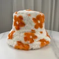 Detail view of winter plush floral bucket hat with soft white and orange fur. - M (56-58cm) / Orange