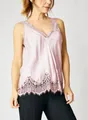 Detailed view of a pink V-neck camisole featuring exquisite floral lace trim on a model - Pink