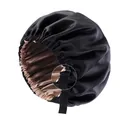Detailed view of the adjustable elastic strap and buckle on this double-layer satin sleep cap - One Size / Black