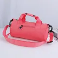Coral pink cylindrical sports duffel bag for yoga and dance with adjustable strap - Pink