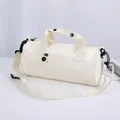 Professional cream-colored cylindrical sports duffel bag for gym, yoga, and swimming - Milky White