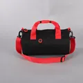 Black and red cylindrical sports gym bag with adjustable shoulder strap - Black + Red