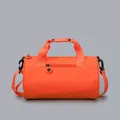 Vibrant bright orange cylindrical sports gym duffel bag with durable handles and strap - Orange
