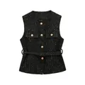 Detailed flat lay of a chic black tweed vest featuring gold buttons and a matching belt - S / Tops / Black