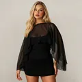 Close-up detail of the sheer mesh cape overlay on a black mini bodycon bodycon dress. - S / Top And Bottom / Black