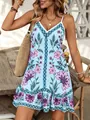 Ärmelloses Sommerkleid mit Blumenmuster in Hellblau und Rüschensaum für den Urlaub - S / Oberteile / Blau