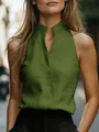 Camicetta senza maniche con collo alto in verde testurizzato per look elegante. - Verde