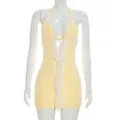 Detailed view of yellow lace mini dress with white ruffled front and sexy halter neck design - Yellow
