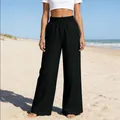 Vue détaillée de la taille élastique haute sur le pantalon en jean noir à jambe large - S / Bas / Noir