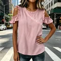 Close-up of pink cold-shoulder top with ruffle sleeves and decorative diagonal buttons. - S / Tops / Pink