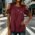 Detailed view of maroon cold shoulder top featuring ruffle sleeves and diagonal buttons - S / Tops / Burgundy