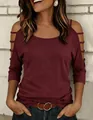 Detailed view of burgundy cold-shoulder T-shirt featuring stylish cutout sleeve design - S / Tops / Burgundy