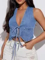 Detailed view of sexy deep V-neck denim vest featuring front tie closure for women - M / Tops / Medium Blue