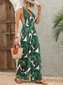 Detailansicht eines Jumpsuits mit tropischem Blattmuster, Neckholder und rückenfreiem V-Ausschnitt - S / Oberteil Und Unterteil / Grün