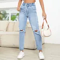 Ripped straight-leg jeans for women in a light blue wash denim - XS / Bottoms / Light Blue
