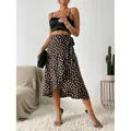 Chic black and tan polka dot print wrap midi skirt with waist tie and side split detail - S / Bottoms / Black