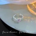 Eleganter silberner offener Ring mit pinkfarbenem Herzzirkon und Schmetterlingsflügeln. - Schmetterlings/Rosa Herz Strass-Stil (J895 Silber) / Silber