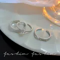 Elegantes Set verstellbarer silberfarbener Ringe mit funkelnden Zirkonia-Steinen. - Gemischtes 3er-Set (J873 Silber) / Silber