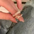 Elegantes vergoldetes offenes Ring-Set mit Zirkon und weißem Inlay für moderne Damen - Perlmutt/Gürtelschnalle 2er-Set (J968 Gold) / Gold