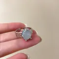 Eleganter verstellbarer Silberring mit hellblauem ovalem Edelstein und Luxusdesign - Hellblauer Ovaler Edelstein/Vierzack-Stil (J1008 Silber) / Silber