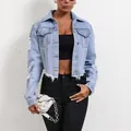 Casual distressed light blue cropped denim jacket with long sleeves and raw hem detail - XS / Tops / Light Blue