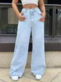 Front view detail of high-waisted light blue wide-leg denim jeans for women - L / Bottoms / Light Blue