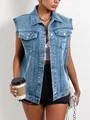 Close-up of a women's vintage blue denim vest styled with black shorts and accessories - XS / Tops / Light Blue