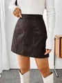 Detail view of a brown high-waist PU leather mini skirt with chic vertical seams. - S / Bottom (72660#) / Coffee Brown