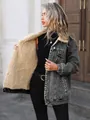 Close-up of the warm faux fur lining inside a loose grey denim jacket for women. - XS / Tops / Gray