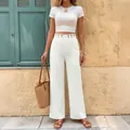 Stylische weiße Freizeithose mit weitem Bein und aufwendigen Spitzen-Hohlsaum-Details - S / Gebrochenes Weiß