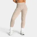 Detailed view of seamless high-waist leopard print yoga leggings for fitness training - XS / Bottoms / Cream Leopard