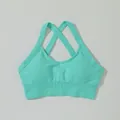 Reggiseno sportivo senza cuciture verde menta con spalline incrociate sul retro - Taglia S / Top / Verde menta