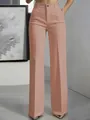 Detail van een roze pantalon met hoge taille, wijde pijpen en een scherpe vouw - Roze