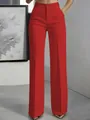 Detailweergave van de felrode minimalistische pantalon met hoge taille en wijde pijpen - Rood