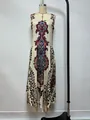 Sleeveless bohemian floral printed maxi dress displayed on a cream mannequin stand - 1XL / Top And Bottom / Apricot