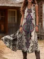 Bohemian vintage print sleeveless V-neck maxi dress shown in a rustic outdoor setting - S / Apricot