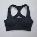 Black seamless cationic sports bra with racerback design for professional yoga fitness - S / Tops / Black
