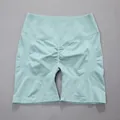 Seamless scrunch butt yoga shorts in mint green for fitness training - S / Bottoms / Pale Green