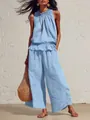 Detaillierte Ansicht eines blauen Boho-Leinensets mit Rüschentop und weiter Hose - Himmelblau
