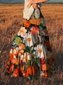 Detailed view of bohemian floral print long skirt with an oil painting style. - S / Bottoms / Orange