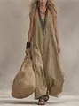 Detalle de vestido largo bohemio caqui con collares étnicos y un bolso de paja tejido - S / Arriba y Abajo (Estilo Chaleco) / Caqui