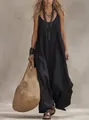 Detalle de vestido largo bohemio negro para mujer con bolso de paja trenzada y collar - S / Arriba y Abajo (Estilo Chaleco) / Negro