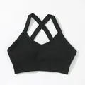 Reggiseno sportivo nero senza cuciture con spalline incrociate per yoga e fitness - Taglia S / Top / Nero
