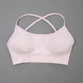Premium light pink seamless yoga sports bra featuring elegant cross-back straps and ribbed band - S / Top (Cross-Back Straps) / Light Pink