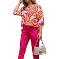 Woman wearing colorful geometric print top and pink pants holding a beige handbag - Orange Red Lines