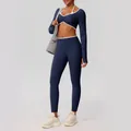 Set yoga blu navy con top corto a maniche lunghe e leggings elasticizzati sportivi - Taglia S / Top E Pantaloni / Blu Notte