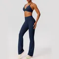 Nauwsluitende marineblauwe yogaset met flared broek met hoge taille en sportbeha - Marineblauw